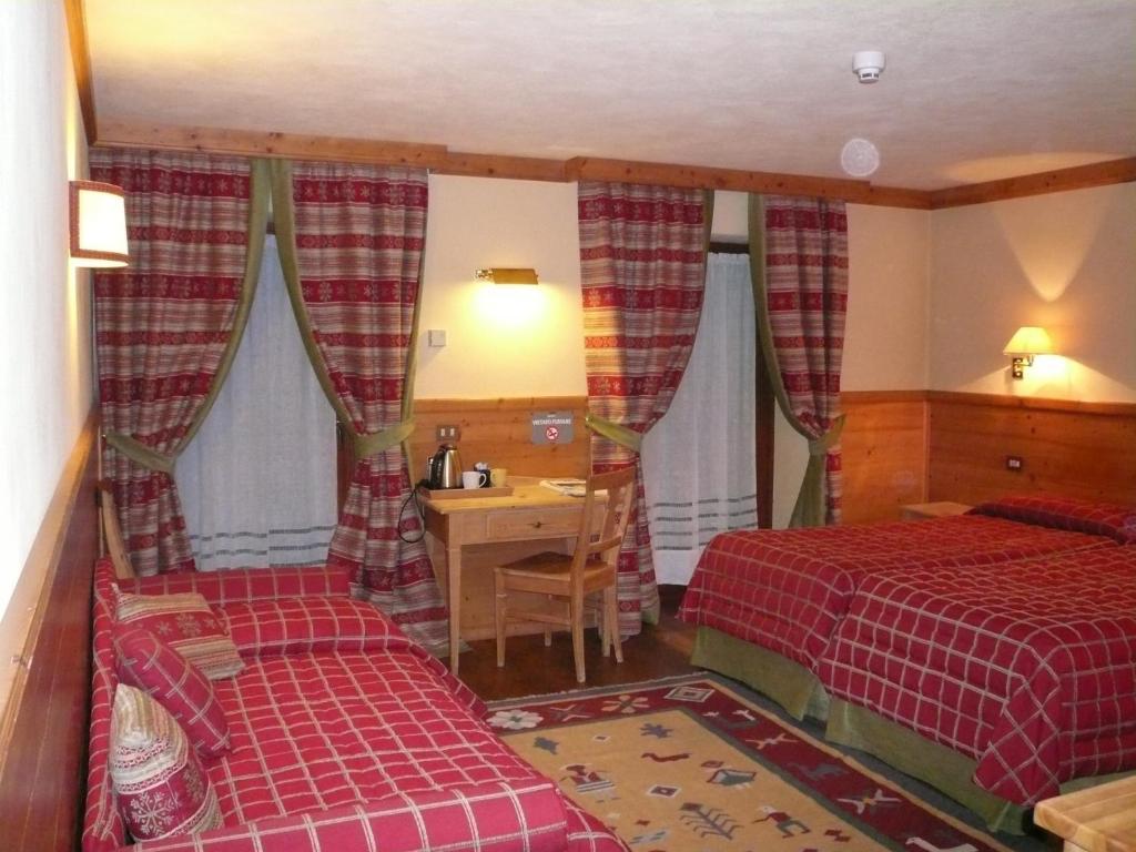 Hotel Mignon Брей-Червиния Номер фото